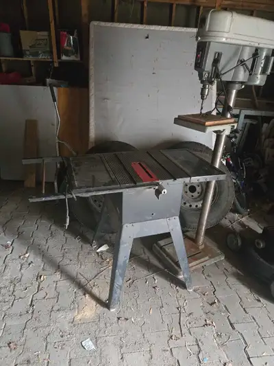 Table saw, no saw. The start button is broken and could be fixed if you are handy. OBO need gone