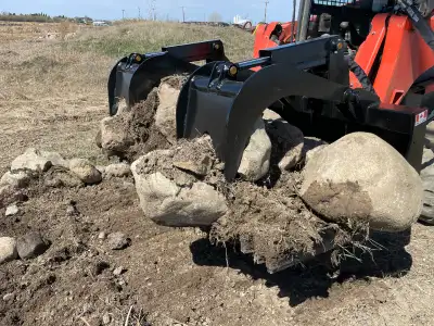 Extreme duty grapple for handling rocks, trees, roots, manure, posts, demolition, pipe, steel, or an...