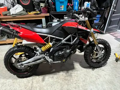 2012 Aprilia 1200 Dorsoduro comes with K&N air filter, SC project dual carbon fibre exhaust sounds a...