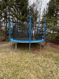 Trampoline with safety enclosure 