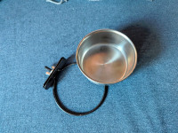 NEW.  Stainless steel small pet dish, 4 inch diameter