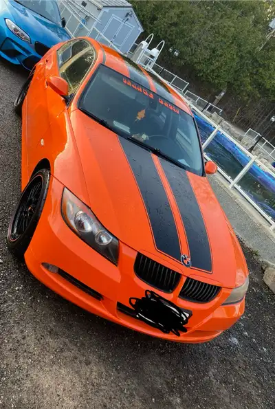 2008 328i BMW Wrapped in Orange with black stripe Needs battery , Sold as is 4000 obo