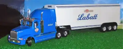 Modèle Italeri...De ma collection...Modèle Statique...Camion Western Star et remorque adaptée décoré...