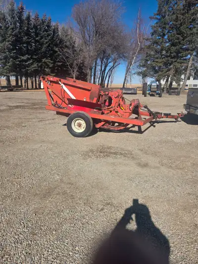 Older pto rock picker to be sold at ritchie brothers auction lethbridge LTD in the march 19th and 20...