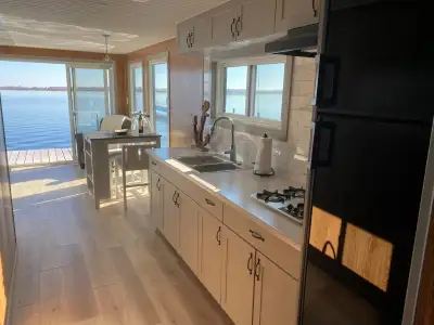 Every room has a view on this stunning marina model houseboat with 2 private bedrooms and a 3 piece...