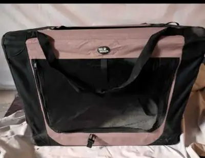 Découvrez cette grande cage de transport pour animaux, idéale pour vos compagnons à quatre pattes lo...