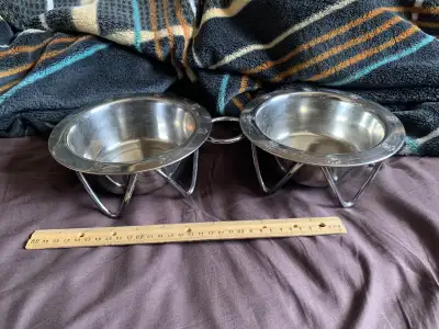 Two Raised metal pet food bowls, View more