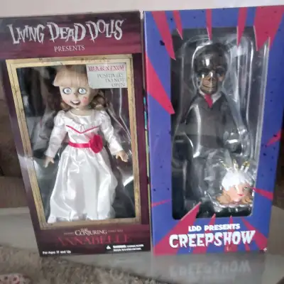 The Perfect Christmas Present. Still in box and in perfect Condition. Each Living Dead doll is $150....