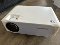 Vankyo 630W projector, portable 60 projector screen 