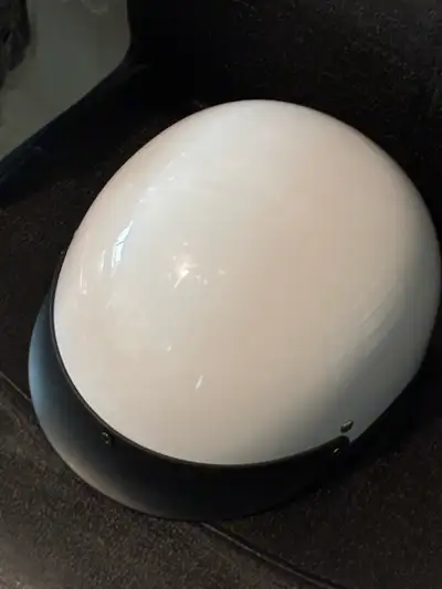 Clean, used once. This is a white DOT-approved motorcycle helmet. It's a size medium, fitting head c...