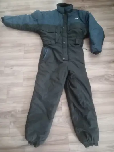 Mens Kamik one peice snowsuit / snowmobile suit. In good condition. No rips or tears. All snaps and...