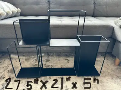 Like NEW large black metal decorative wall hanging perfect for all kinds of knickknacks. Pick up in...