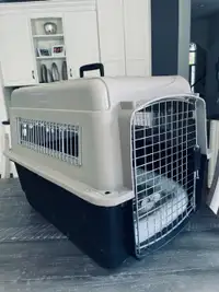 "Petmate" pet kennel with bed & attached food/water bowl