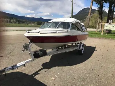 1986 16 ft Malibu boat with full Bimini top on trailer for sale . All in good condition .