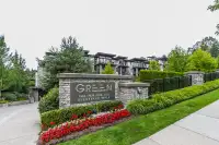 Living in quiet parkland, steps from SkyTrain & shopping 2BR+2Ba