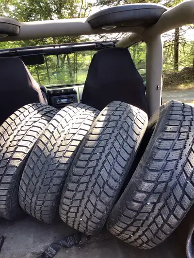 Like new winter studdable tires. Set of 4 215/70/15.