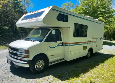Beautiful and solid. No leaks (roof replaced last year). Space over cab for sleeping or storage. Que...