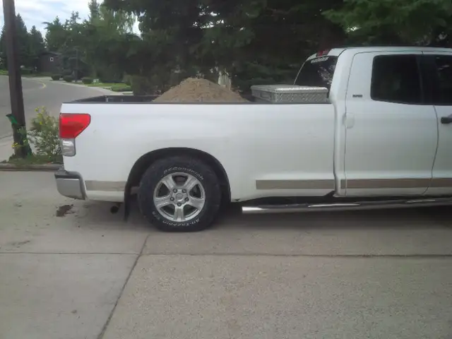A Guy With A Strong Back & A Strong Truck Hauling63347531805187123