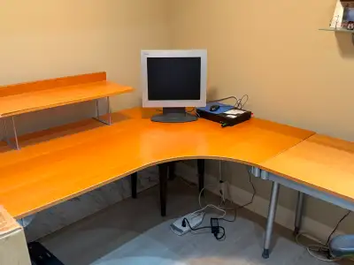 Ikea L-shaped wood desk and office chair, View more