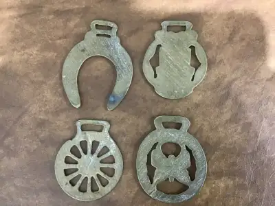 Antique set of 4 bridle or saddle bronze plates Each about 2 1/2” x 3”