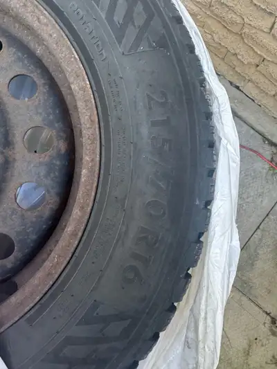 Set of 4 winter tires on rims for sale Size: 215/70R16 Some life still left in them for atleast anot...
