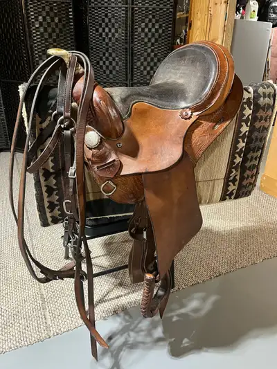 Selling a very nice leather 14" Circle P saddle with a 33" Reinsman saddle pad in very good conditio...
