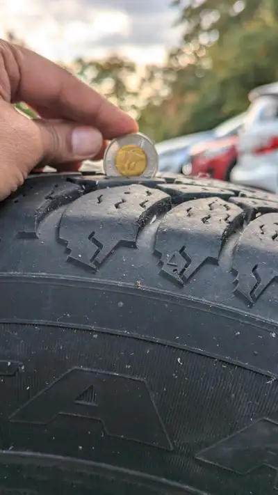 Goodyear Nordic 4 winter tires 235/65/r16. 2 with Honda Alloy rims and others 2 on steel rims. Almos...