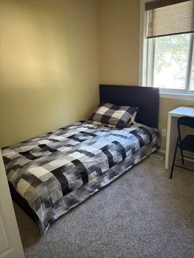 A furnished room is available for rent in a well-kept house located at 10522 108 Ave in downtown Edm...