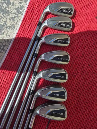 Excellent condition stock graphite reg flex shafts stock lamkin grips still like new #5 to A wedge c...