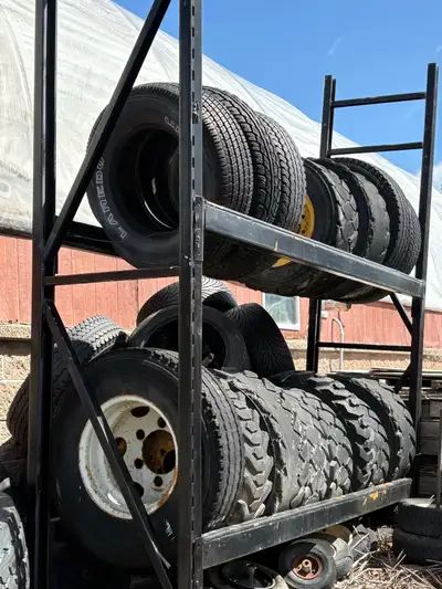 I'm selling a heavy-duty large tire rack that is in good, used condition, perfect for organizing and...