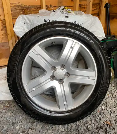 Pirelli P4 Persist All Season tires on original Subaru Rims. 225 55 R17 - 97T 5x100 bolt spacing tir...
