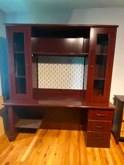 Solid wood computer desk with drawers, cabinets, and bulletin board. Top cabinets / bulletin board i...