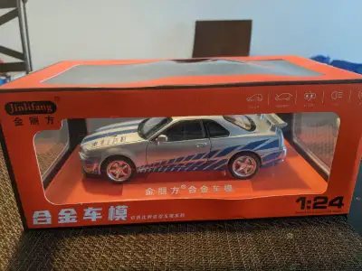 Nissan Skyline GTR R34 V-Spec II 1:24 scale model car. NIB, View more