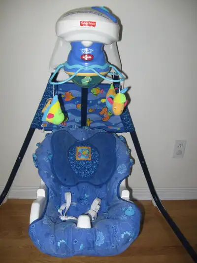 Balançoire musicale bleue Aquarium Fisher Price en bon état, View more