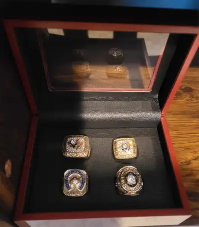 Have 4 Toronto Championship Rings With display case for sale for $80 Rings include 2 Toronto Blue Ja...