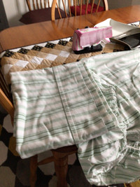 Sheets are white with green stripes