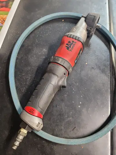 Mac tools 3/8" drive 90 degree air impact wrench. 170ft/lb of torque. Some marks from being used but...