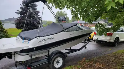 Four Winns 180LX. Has the optional 5.0L motor and extended swim platform. All covers and trailer inc...