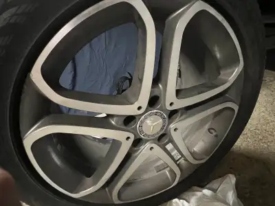 For sale is a pair of Mercedes rims with a five-spoke design, perfect for enhancing the look of your...