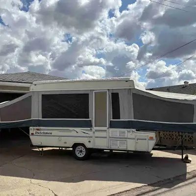 98 Dutchmen Pop Up Tent Trailer. In very good condition, for a 1998 model its still in great shape!...