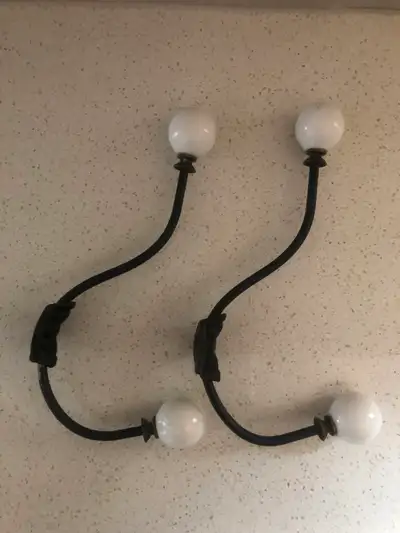 VINTAGE  CAST  IRON  HOOKS, View more