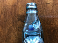 Antique bottle with glass ball