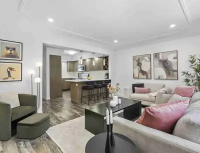 Beautifully updated 4-bedroom River Heights bungalow with 2 full baths, a modern kitchen, dedicated...