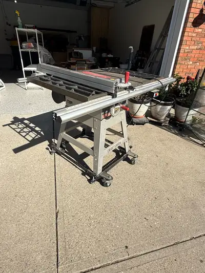 This is a used Craftsman 10-inch table saw, ready to tackle your woodworking projects. It features a...