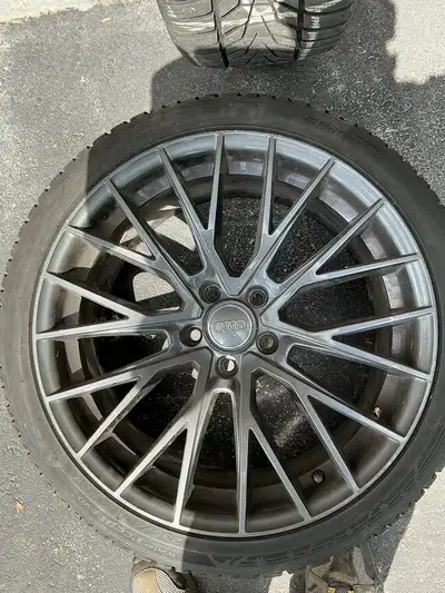 Four hancook winter tires.= with audi rims. I*cept evo 3 235/40 r19 96 V. One of the tires has punct...