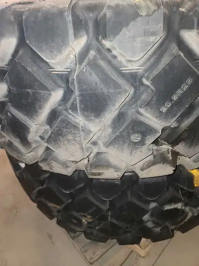Aelous tires, Cat rims( 2 tires with rims) foam filled. Fits 924 928, 930 IT 24/28 and other types o...