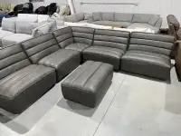New!  Too grain leather sectional with ottoman 