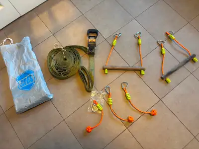 Slackline to hang between trees with accessories. Slack line is in excellent condition. Tree Link Gy...
