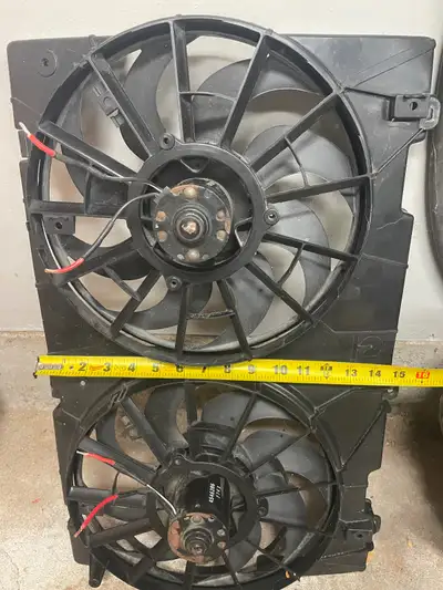 Electric Fans in shroud. Didn’t fit my application. 25” x 15” Will have a battery to test that they...