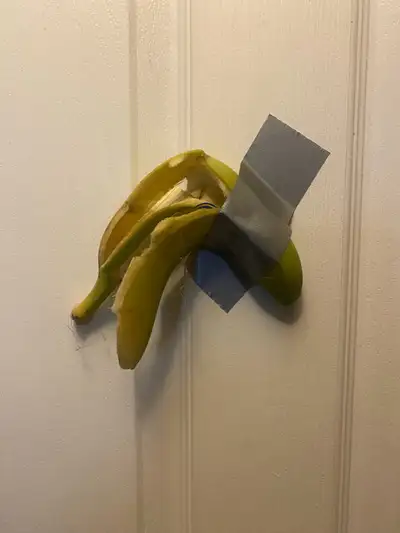 Entitled “ EATEN”has great a-peel  duct taped to door, View more